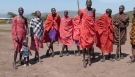 Funny Maasai baby trying to dance with the morans