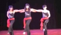 Rhea and her daughters Piper and Melina dance the hasapiko