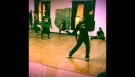 Zumba Fitness Instructor Whacking Waacking at Dance Session